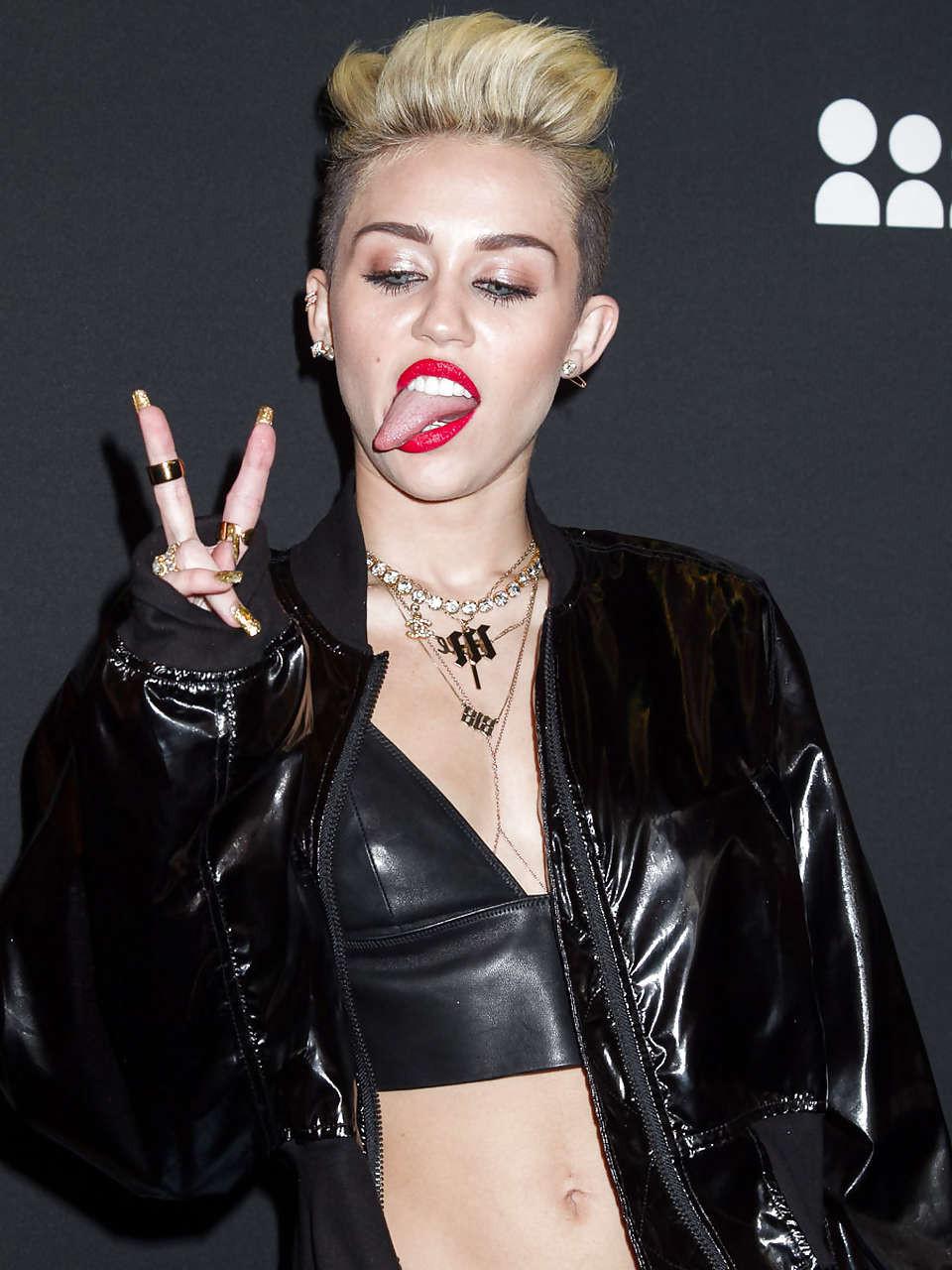 16P Miley Cyrus looking very sexy and hot in black bikini