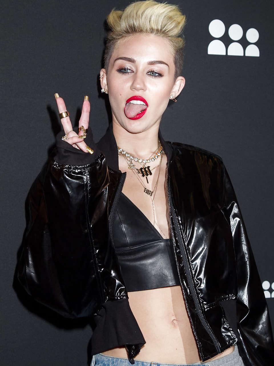 16P Miley Cyrus looking very sexy and hot in black bikini