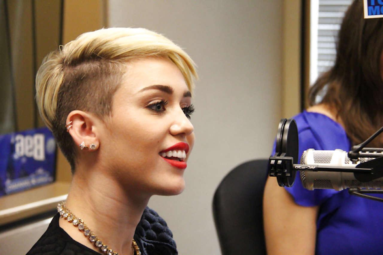 16P Miley Cyrus looking very sexy and hot in black bikini