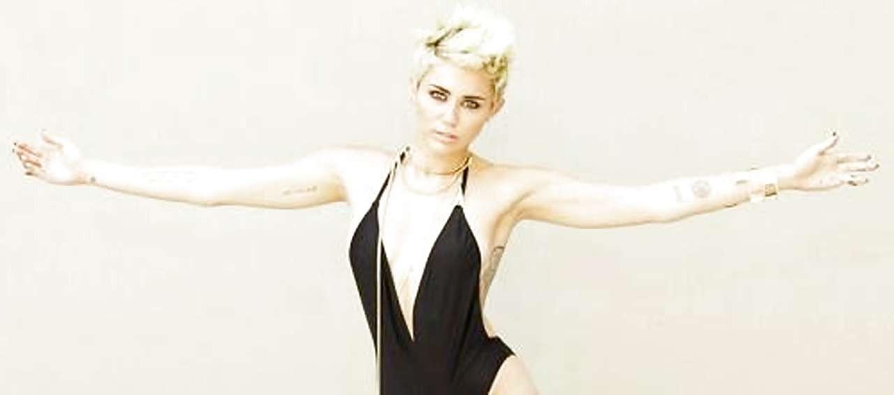 16P Miley Cyrus looking very sexy and hot in black bikini