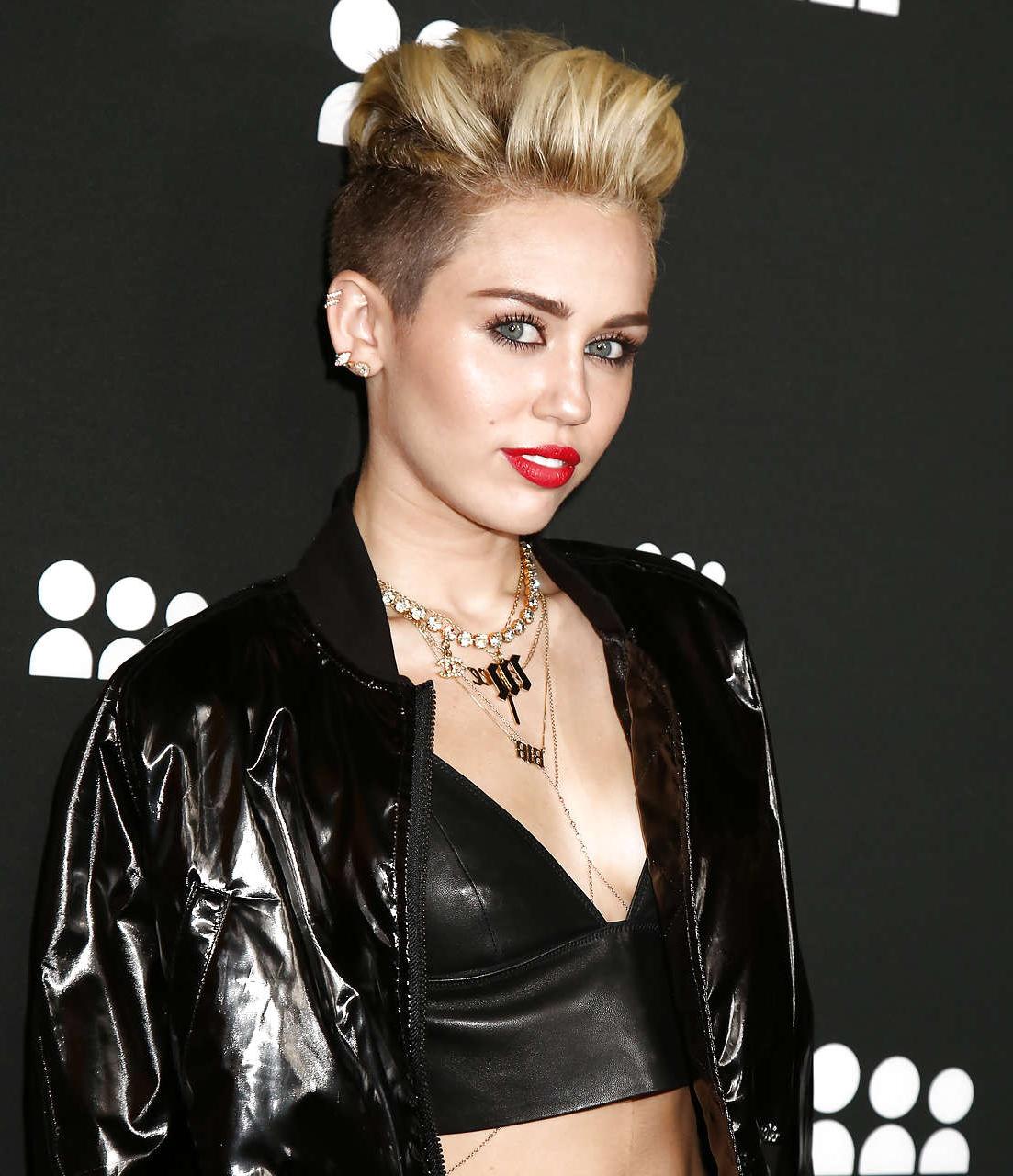 16P Miley Cyrus looking very sexy and hot in black bikini