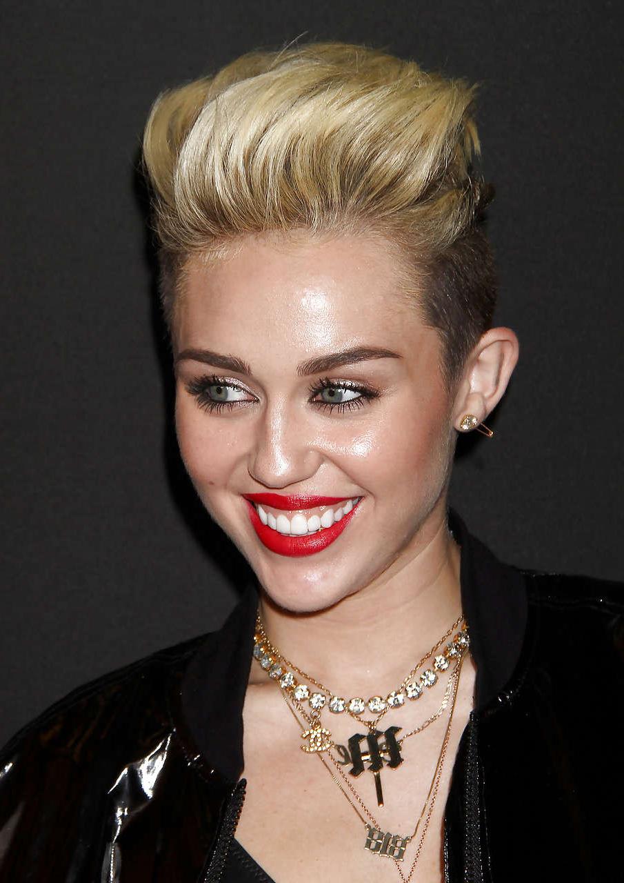 16P Miley Cyrus looking very sexy and hot in black bikini
