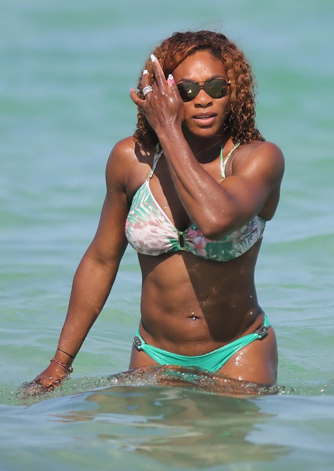 16P Serena Williams showing off her bikini curves at the beach in Miami