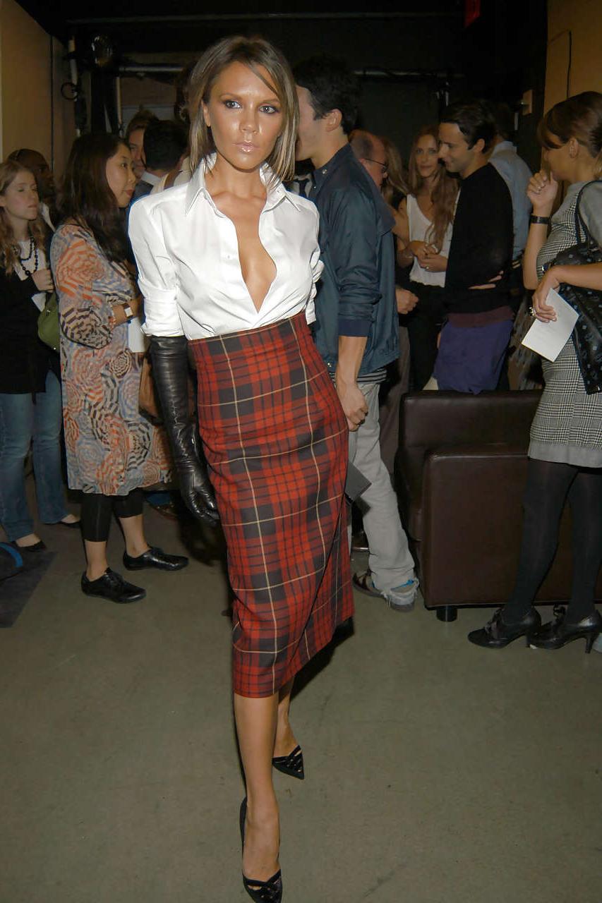 16P Victoria Beckham showing big boobs in see thru shirt