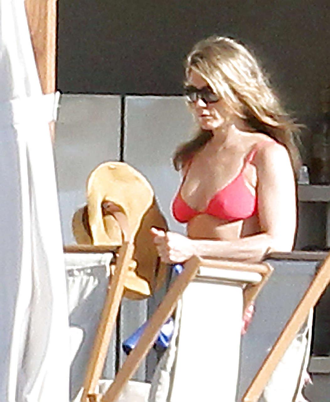 16P Jennifer Aniston looking very sexy and hot in bikini