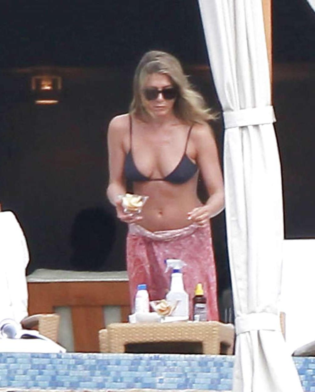 16P Jennifer Aniston looking very sexy and hot in bikini