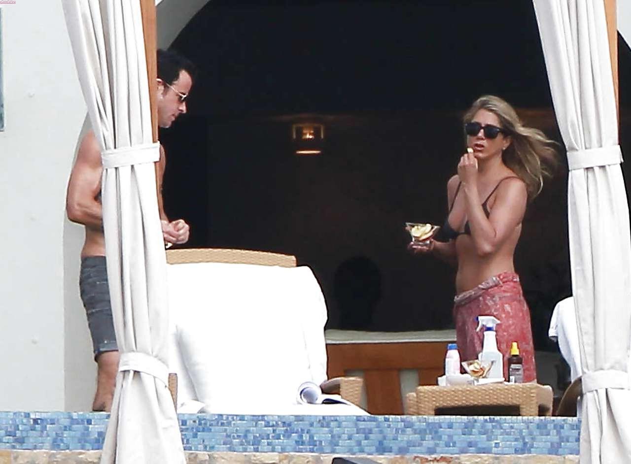 16P Jennifer Aniston looking very sexy and hot in bikini