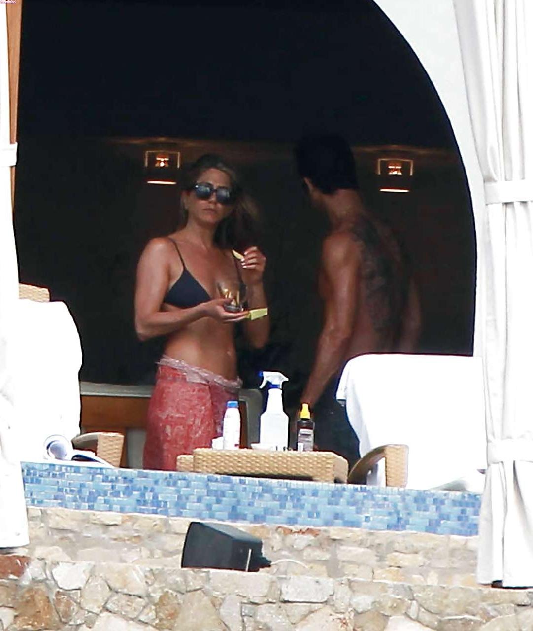 16P Jennifer Aniston looking very sexy and hot in bikini
