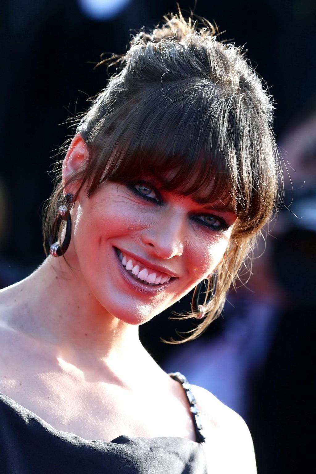 16P Milla Jovovich braless showing side boob at the 'Cleopatra' premiere in Cannes