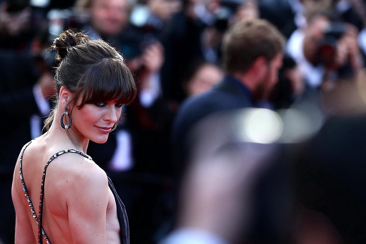 16P Milla Jovovich braless showing side boob at the 'Cleopatra' premiere in Cannes