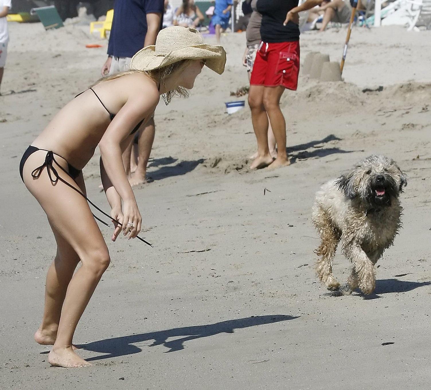 16P Ali Larter wearing tiny black bikini at the beach in Miami