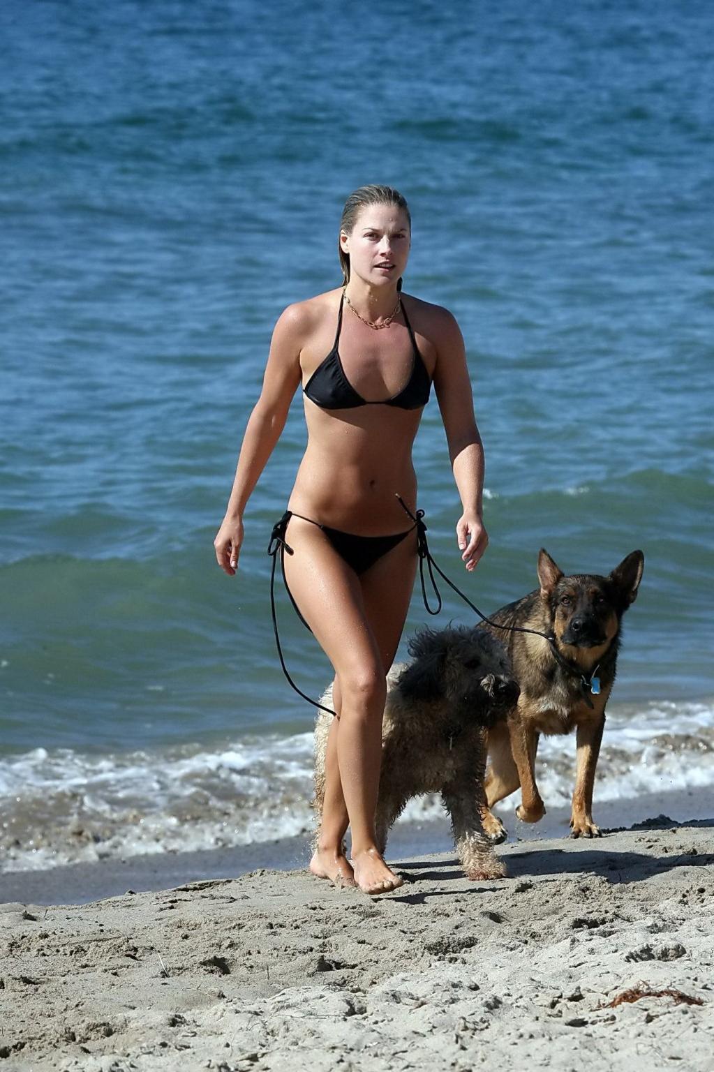 16P Ali Larter wearing tiny black bikini at the beach in Miami