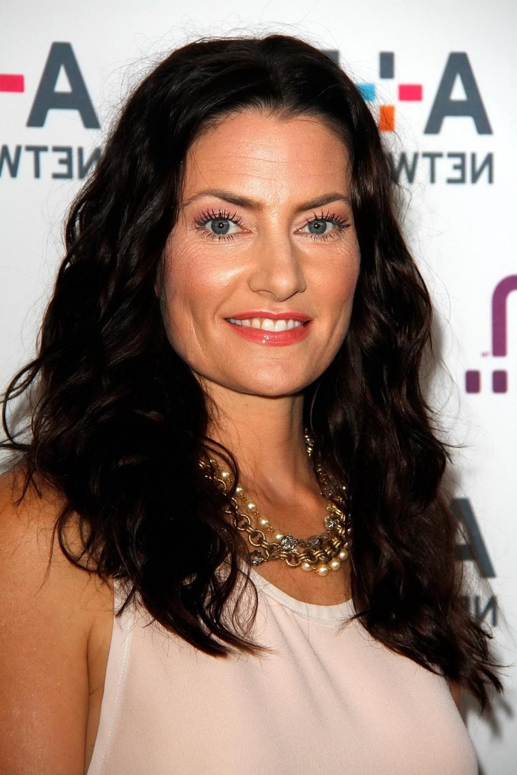 16P Madchen Amick leggy wearing shorts at the  A E Networks Upfront in NYC