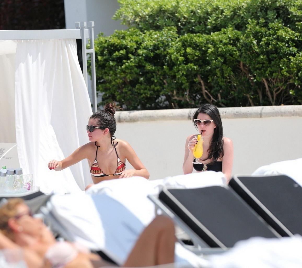 16P Selena Gomez showing off her bikini body poolside in Miami