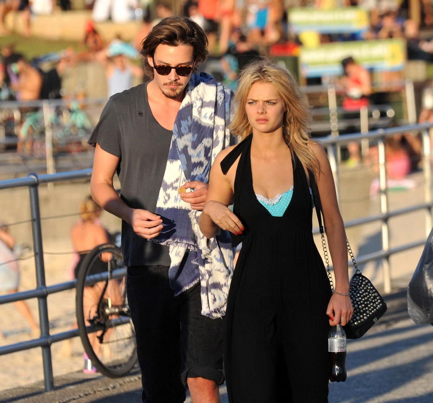 16P Samara Weaving in bikini petting with her boyfriend on Bondy Beach in Australia