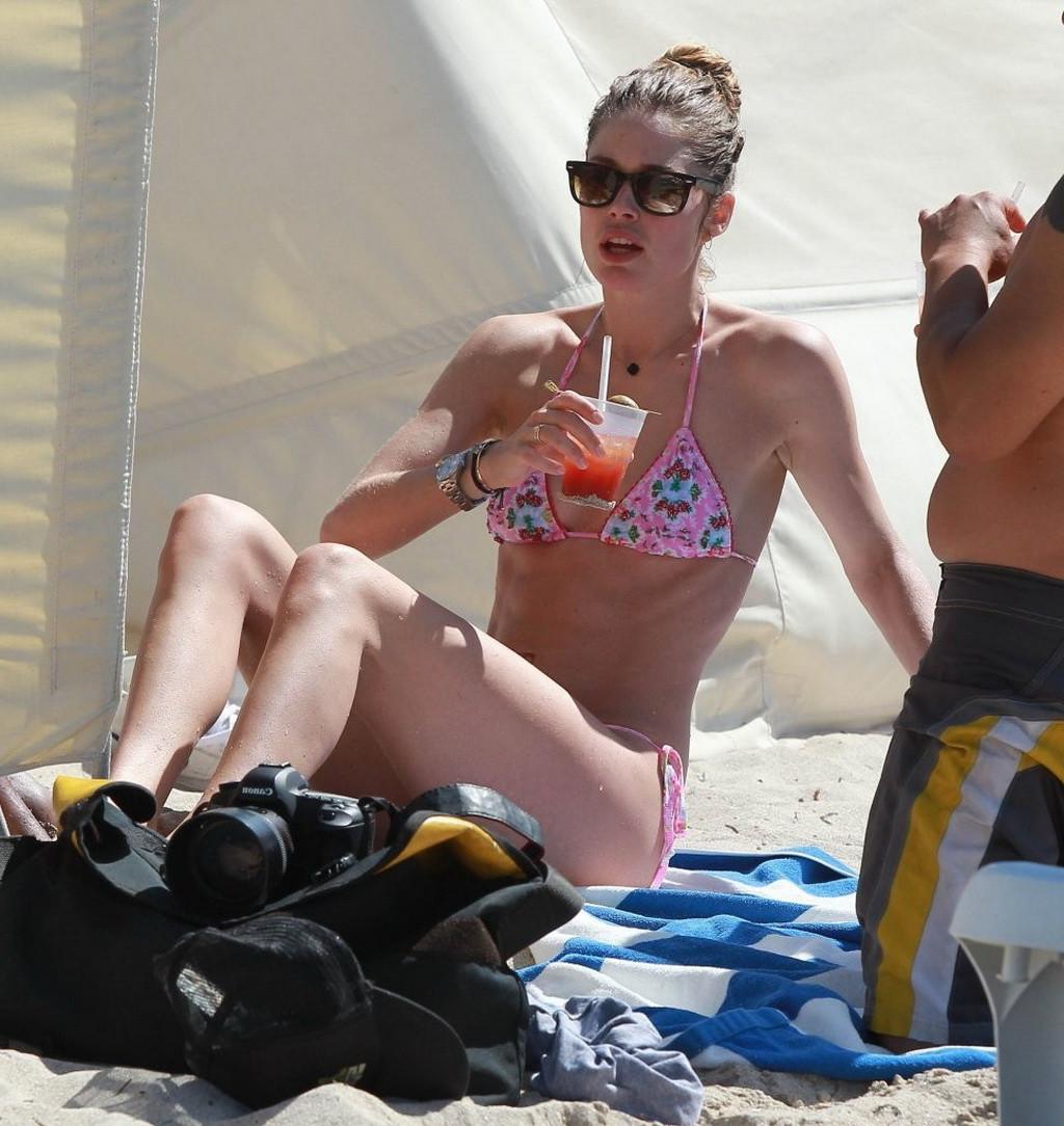 16P Doutzen Kroes wearing tiny pink bikini on the beach in Miami