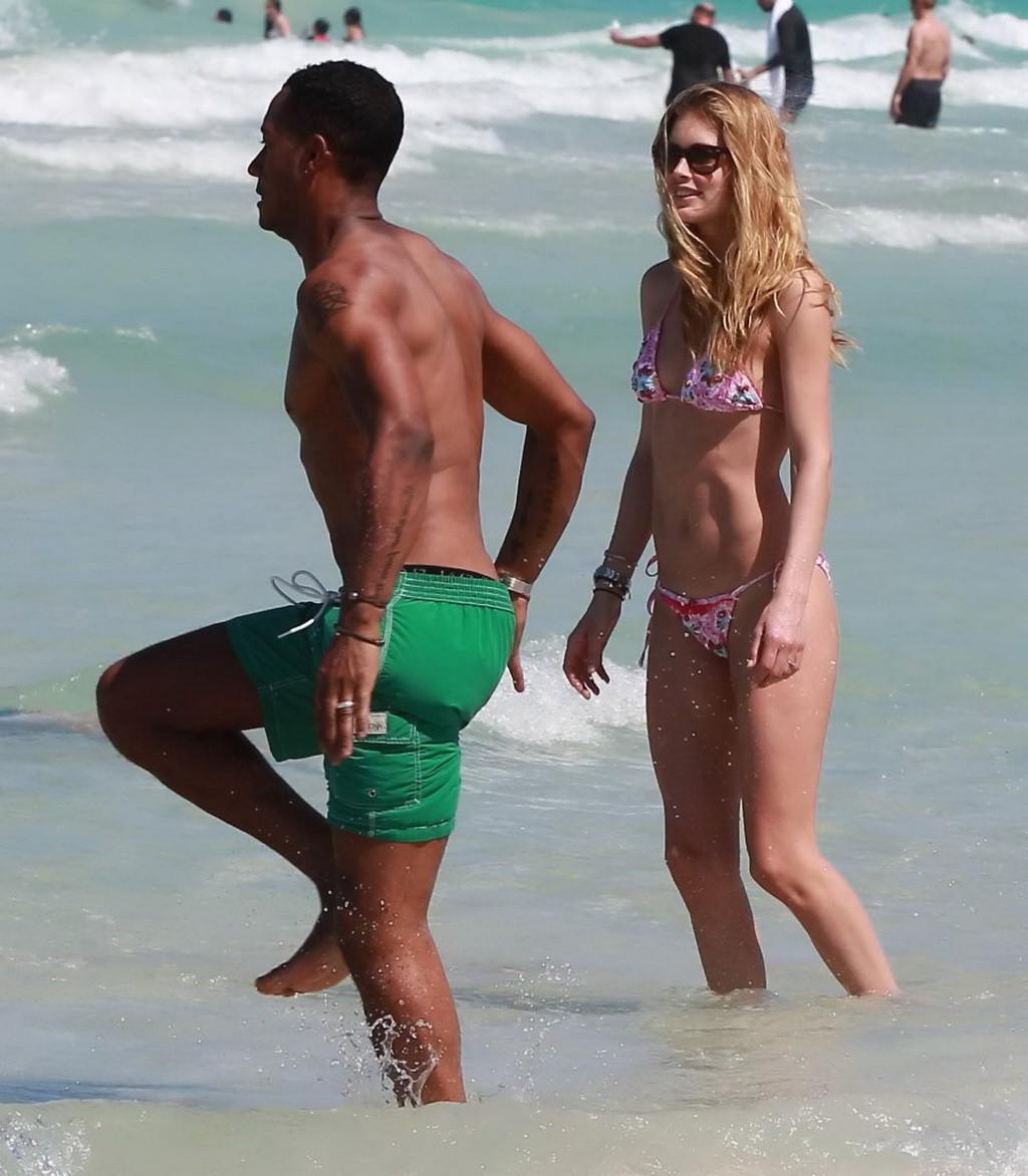 16P Doutzen Kroes wearing tiny pink bikini on the beach in Miami