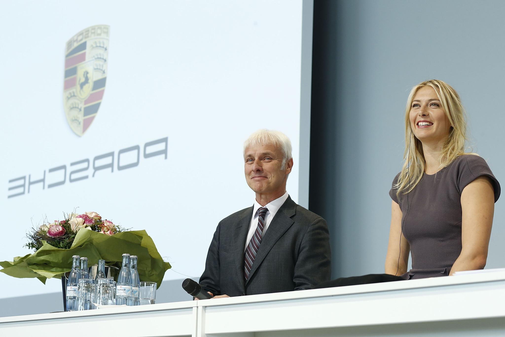 16P Maria Sharapova looks hot wearing a tight gray dress at the Porche event in Stut