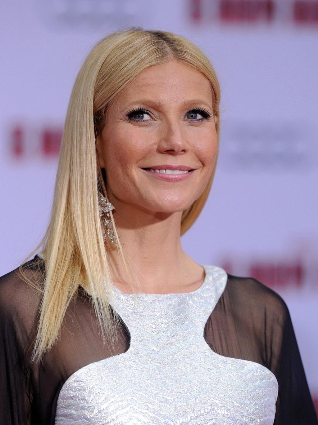 16P Gwyneth Paltrow pantyless wearing a partially see through dress at the' Iron Man