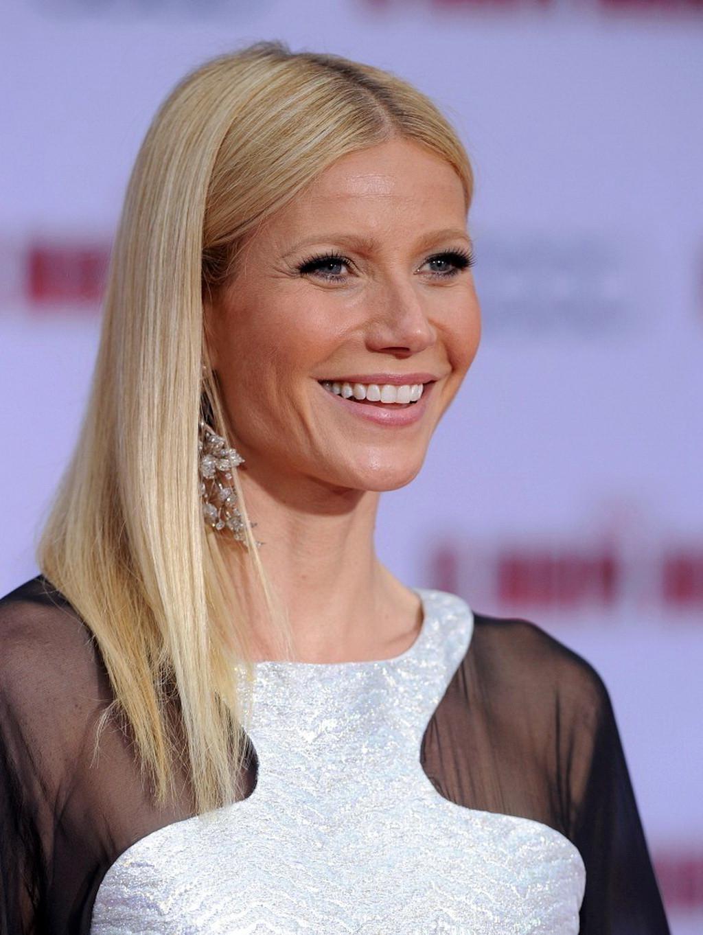 16P Gwyneth Paltrow pantyless wearing a partially see through dress at the' Iron Man