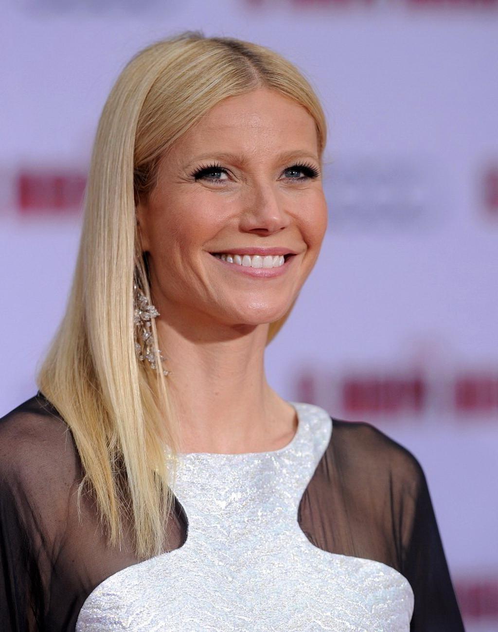 16P Gwyneth Paltrow pantyless wearing a partially see through dress at the' Iron Man
