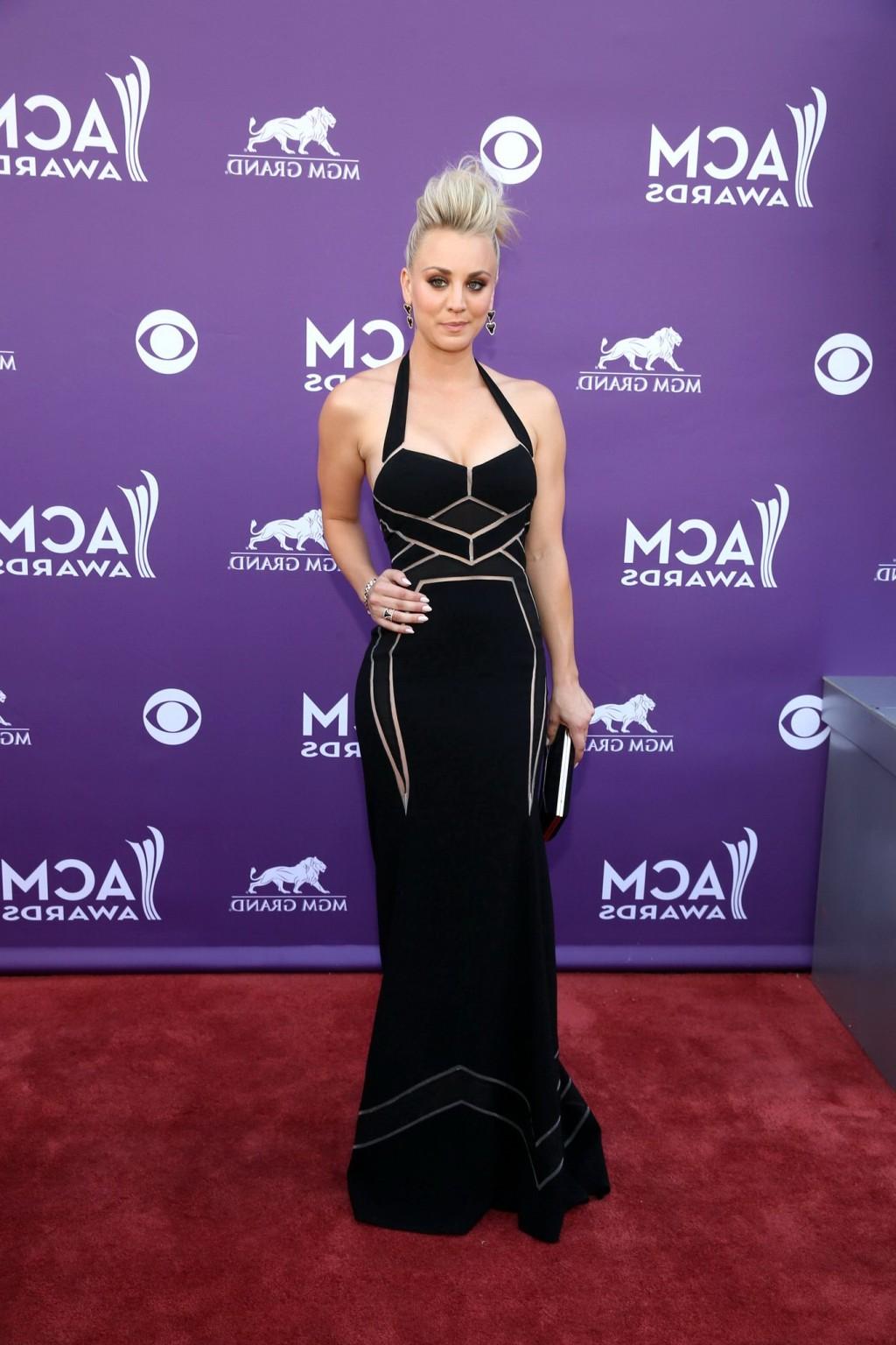 16P Kaley Cuoco shows cleavage wearing a low cut black dress at 48th Annual Academy 