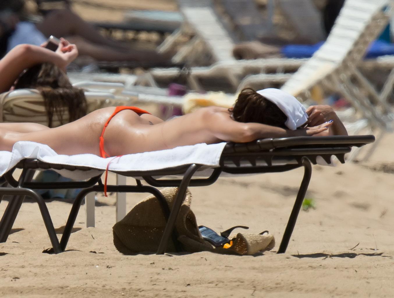 16P Eva Longoria showing off her curvy body in orange bikini at the beach in Puerto 