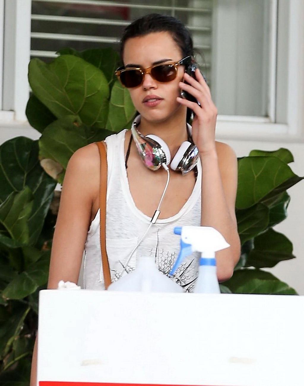 16P Adriana Lima shows off legs  ass wearing a denim shorts out in Miami