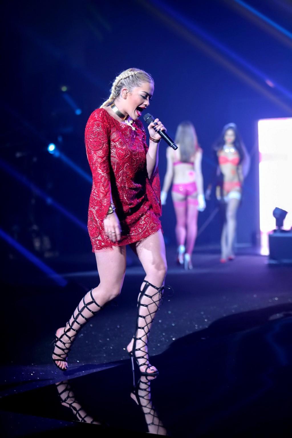 16P Rita Ora upskirt wearing a mini dress  sandals at the Etam Fashion Show in Paris