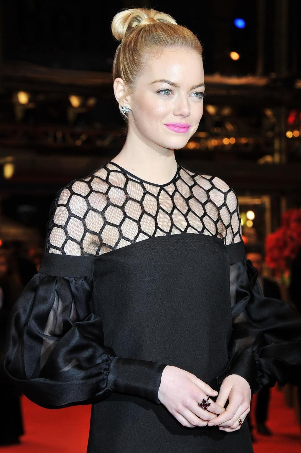 10P Emma Stone leggy wearing a little black dress at 'The Croods' premiere during 63