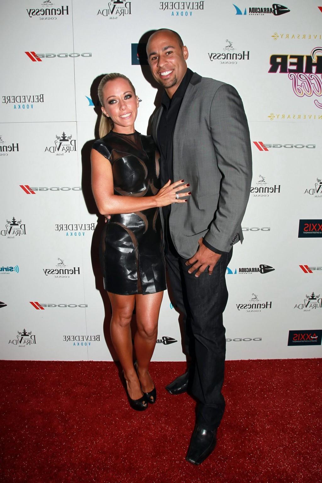 10P Kendra Wilkinson wearing nothing under a partially see-thru mini dress at Leathe
