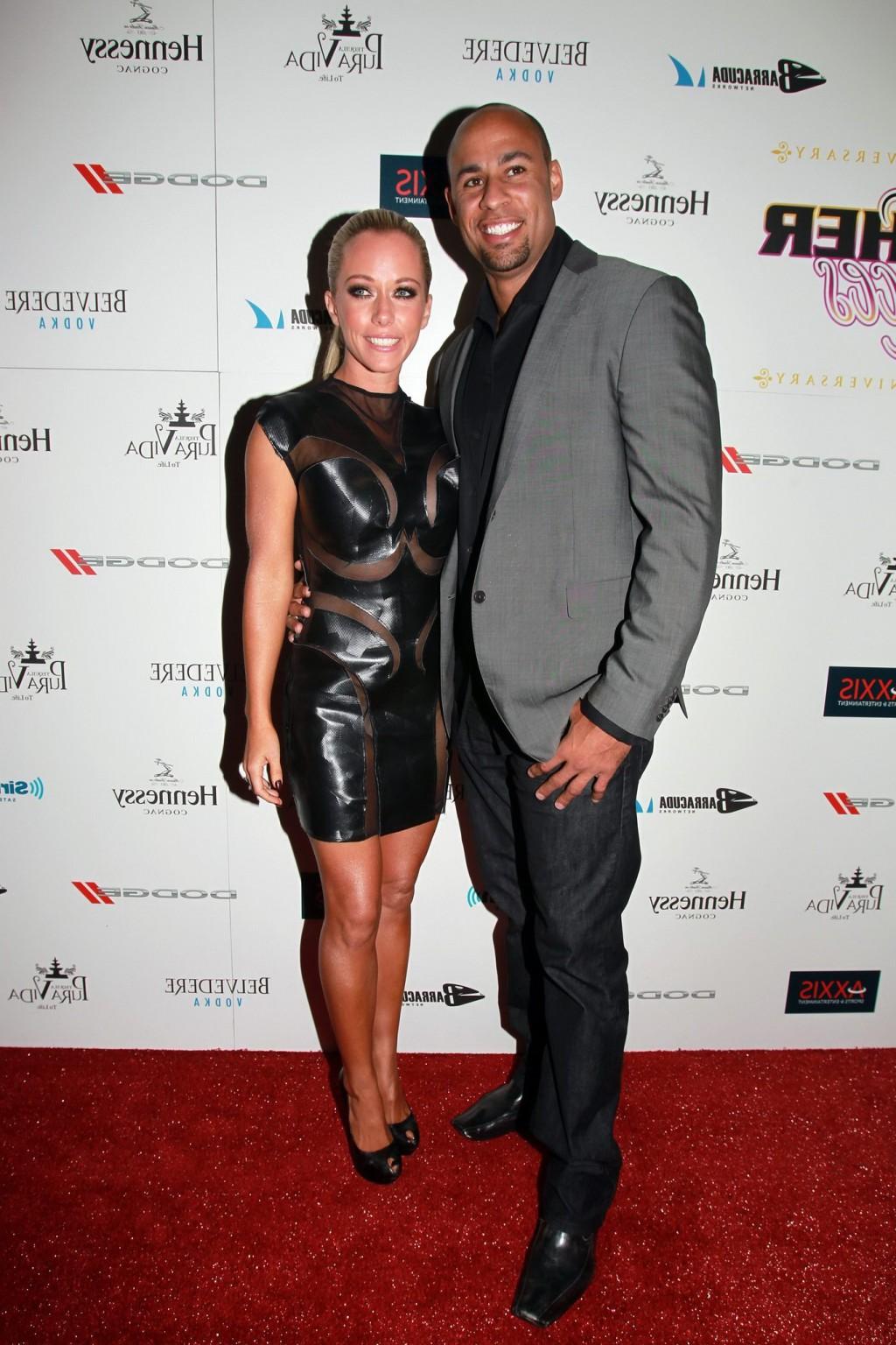10P Kendra Wilkinson wearing nothing under a partially see-thru mini dress at Leathe