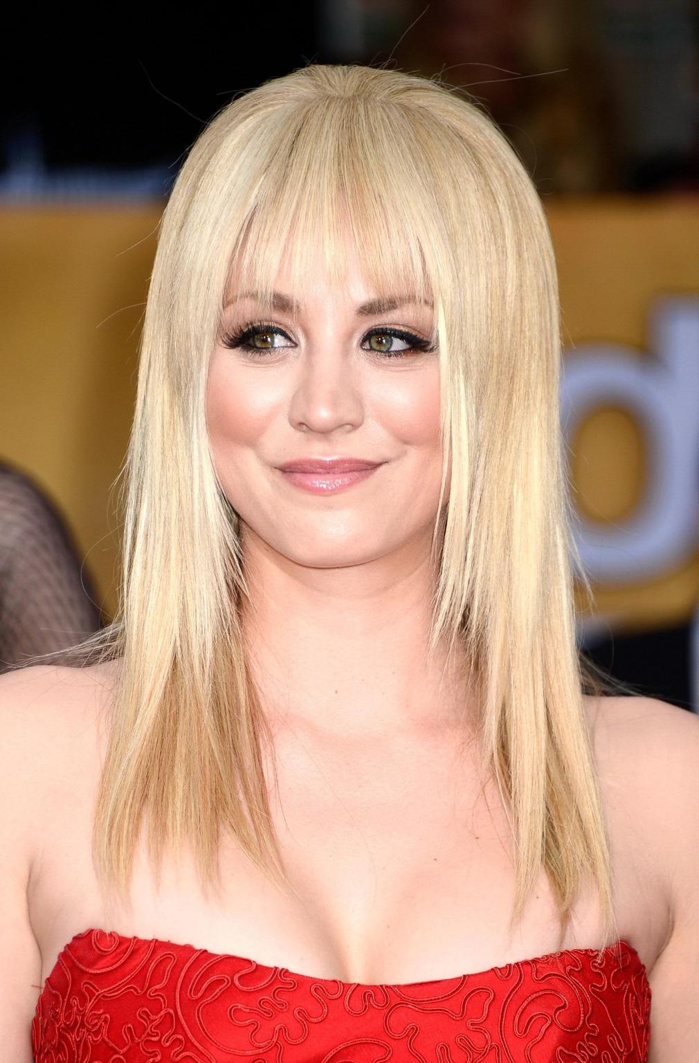 10P Kaley Cuoco shows cleavage wearing a strapless red dress at 19th Annual Screen A