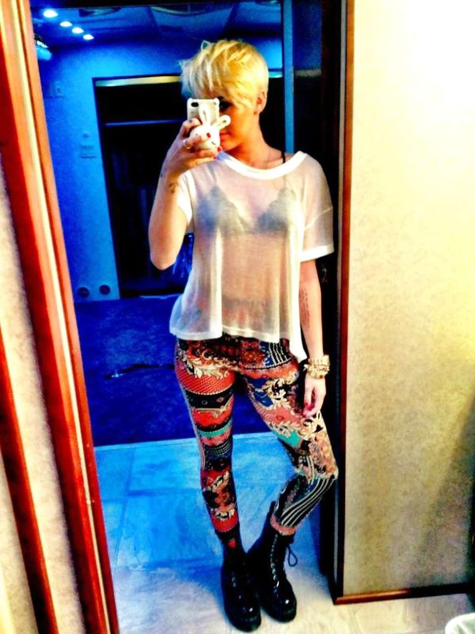 10P Miley Cyrus posing in see thru shirt and showing her great ass in panties