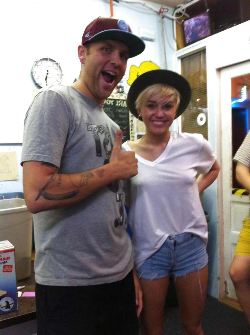 10P Miley Cyrus posing in see thru shirt and showing her great ass in panties