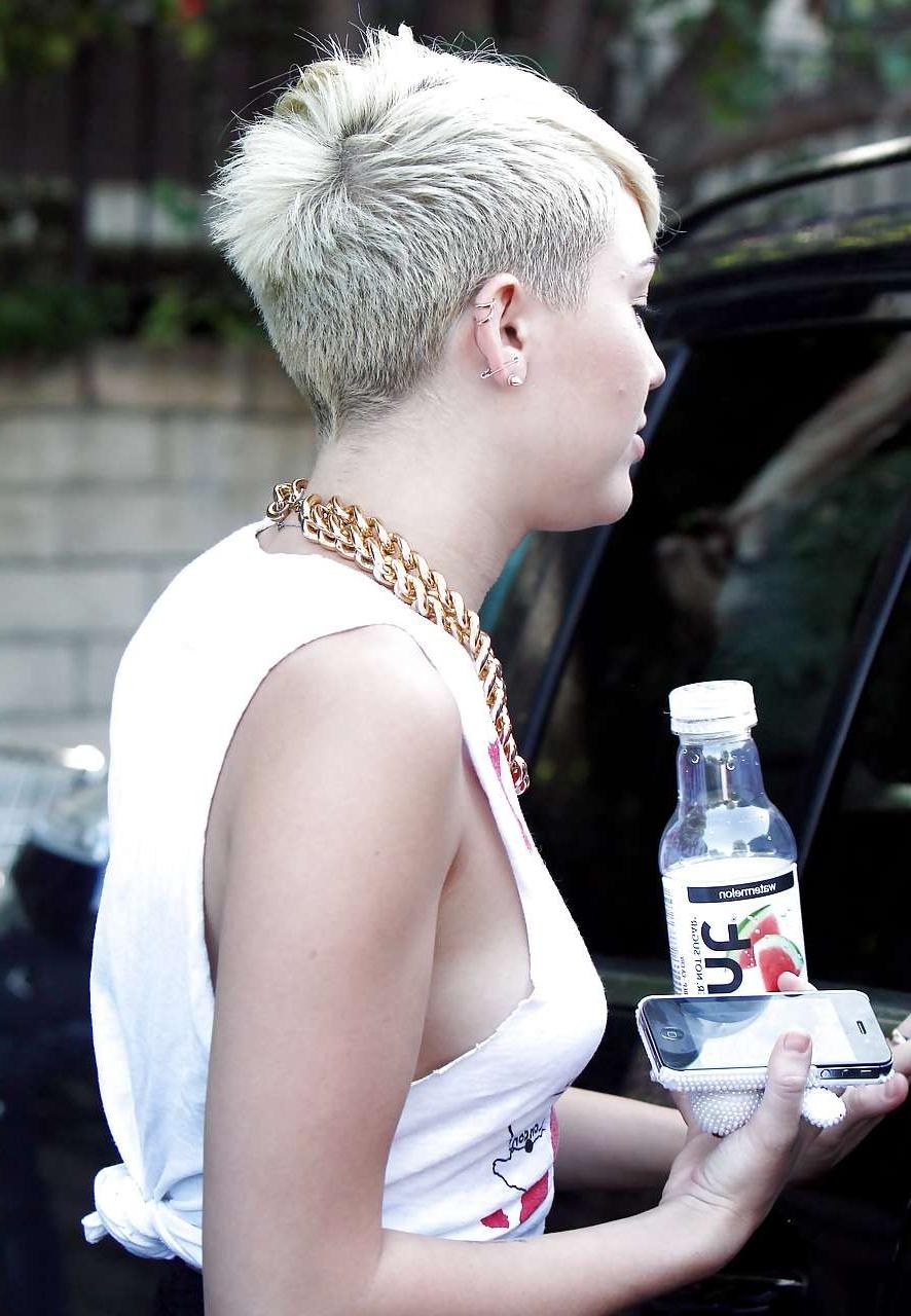 10P Miley Cyrus posing in see thru shirt and showing her great ass in panties