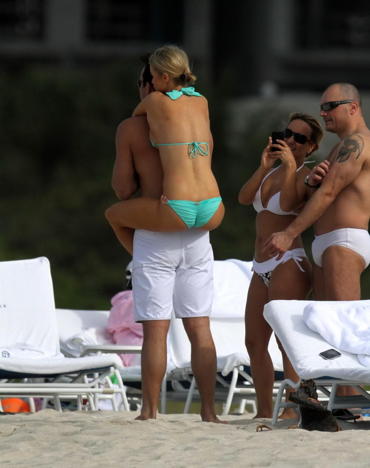 9P Joanna Krupa shows off her bikini body while playing arround with her boyfriend 