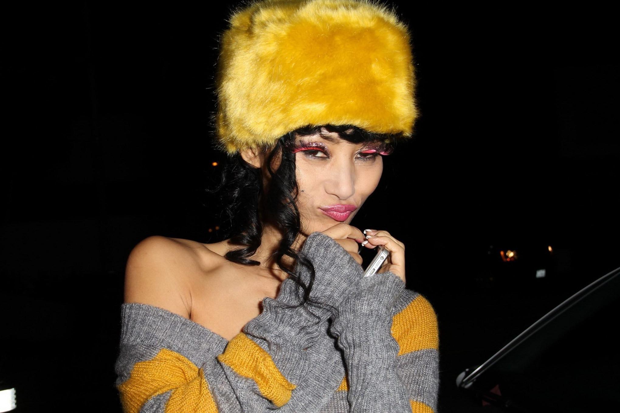 10P Bai Ling braless wearing a knitted see through dress at Greystone Manor in West 