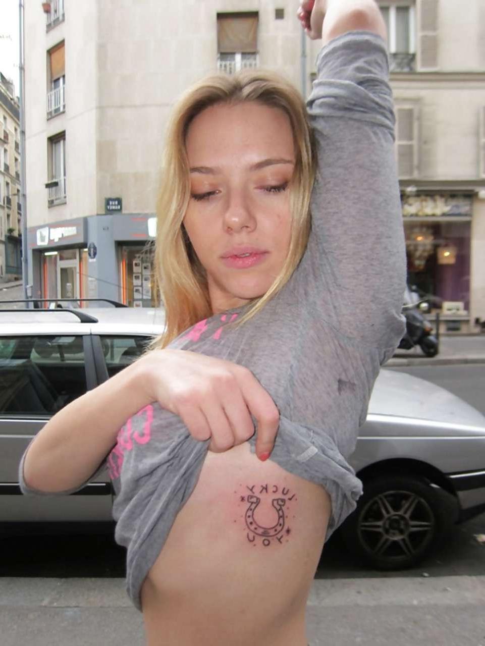 10P Scarlett Johansson exposing her new and sexy tattoo