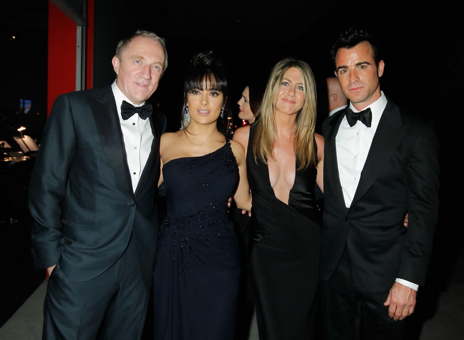10P Jennifer Aniston shows huge cleavage wearing hot black revealing dress at LACMA 
