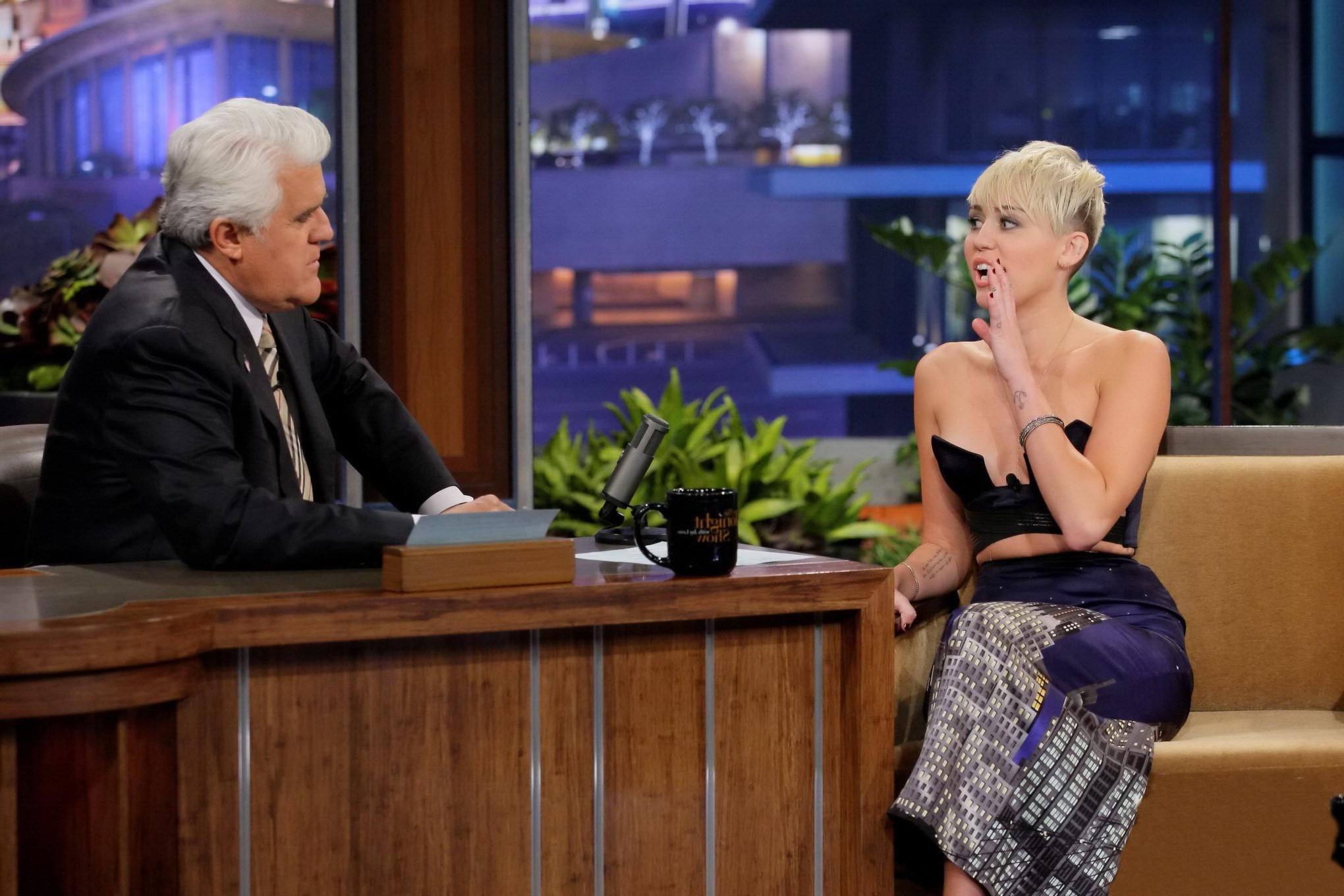 10P Miley Cyrus braless wears very revealing dress on The Tonight Show with Jay Leno