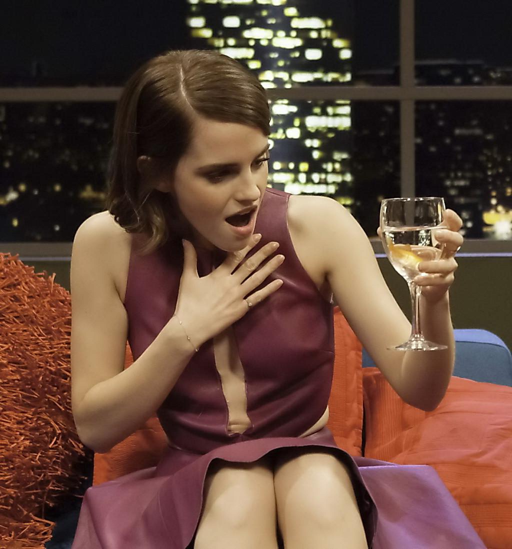 10P Emma Watson leggy shows cleavage in a short low cut leather dress on the Jonatha