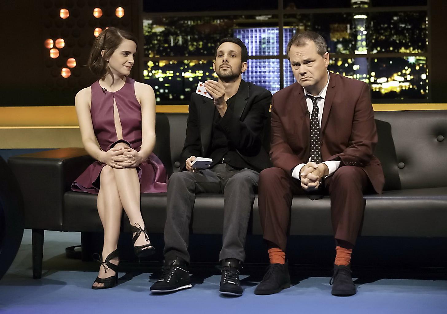 10P Emma Watson leggy shows cleavage in a short low cut leather dress on the Jonatha