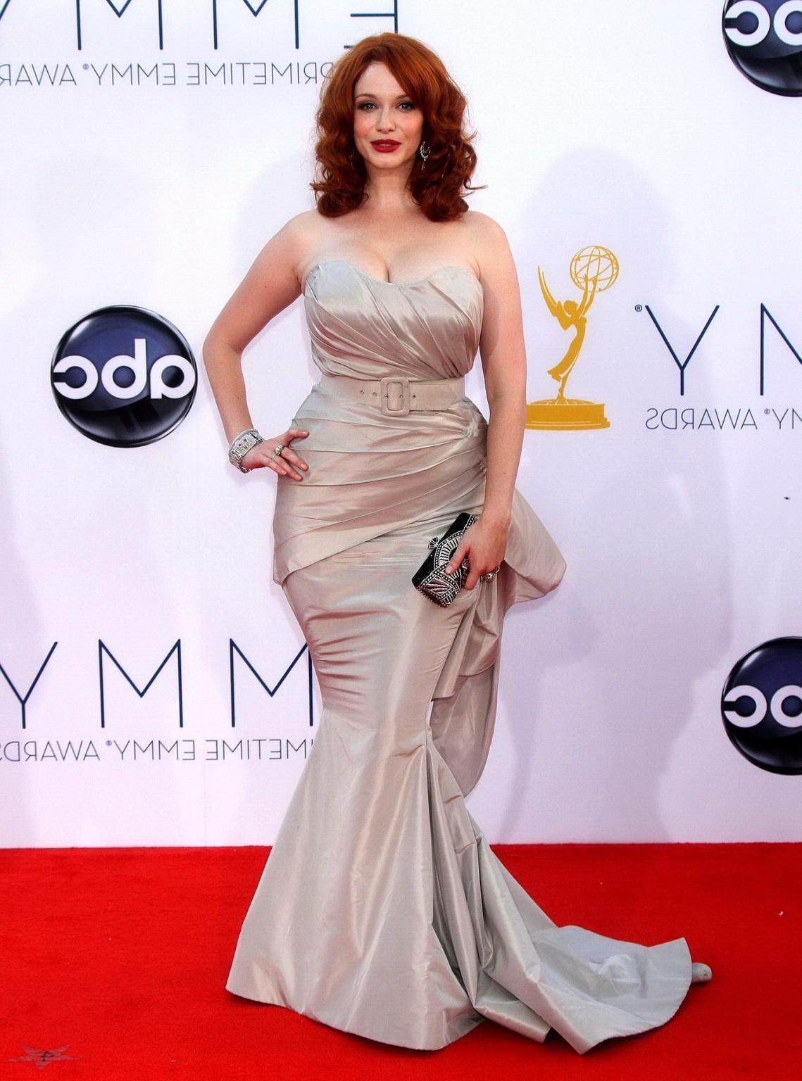 10P Christina Hendricks showing off her melons in low cut dress at 64th Primetime Em
