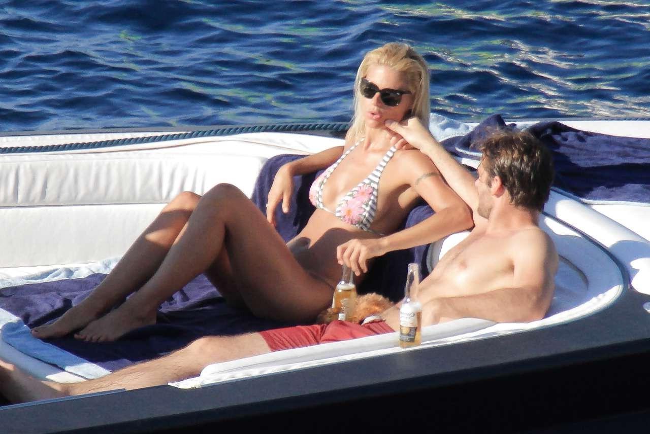 10P Michelle Hunziker showing her great ass in bikini thong paparazzi pictures