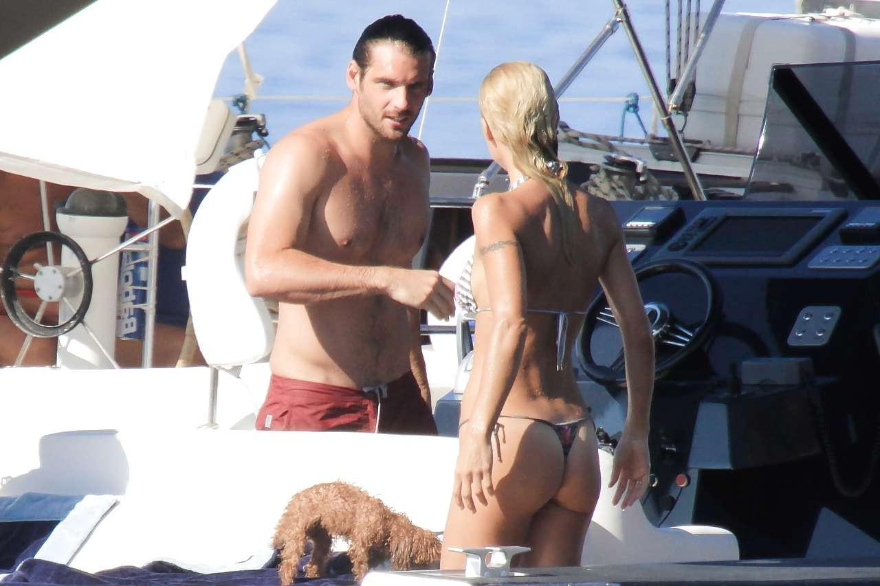 10P Michelle Hunziker showing her great ass in bikini thong paparazzi pictures