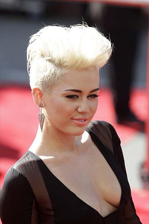 10P Miley Cyrus looking very sexy and huge cleavage photos
