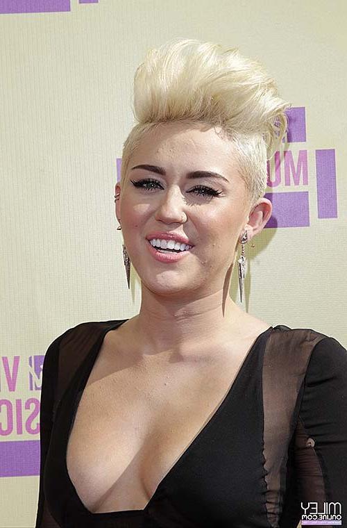 10P Miley Cyrus looking very sexy and huge cleavage photos