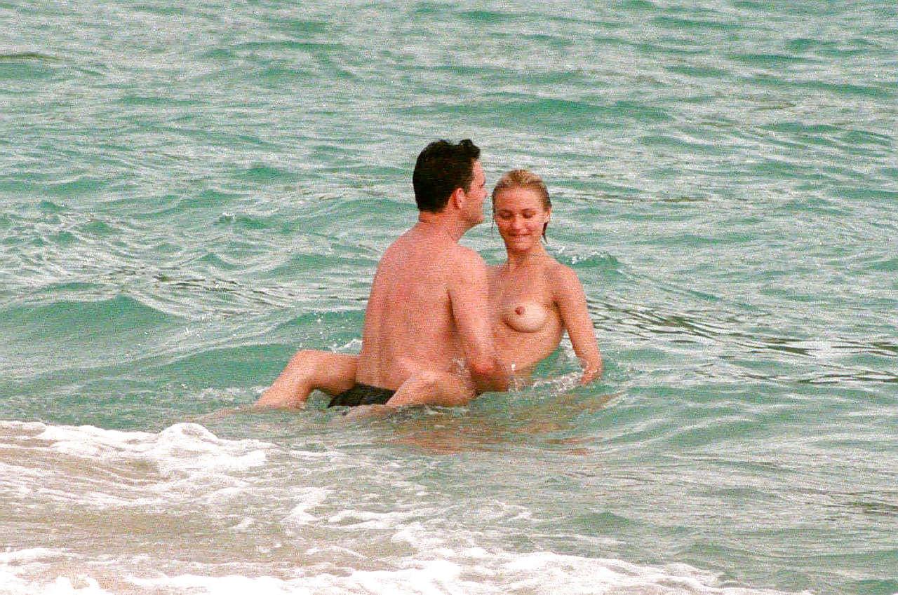 10P Cameron Diaz exposing her nice small boobs while enjoy with boyfriend on beach