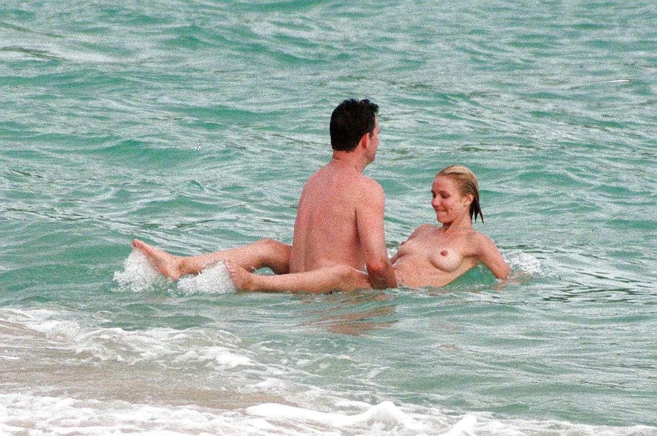 10P Cameron Diaz exposing her nice small boobs while enjoy with boyfriend on beach